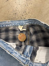 Load image into Gallery viewer, Vintage Flannel Lined Carhartt Jeans (36x32)
