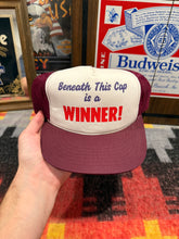 Load image into Gallery viewer, Vintage Beneath This Cap Is A Winner Trucker Hat
