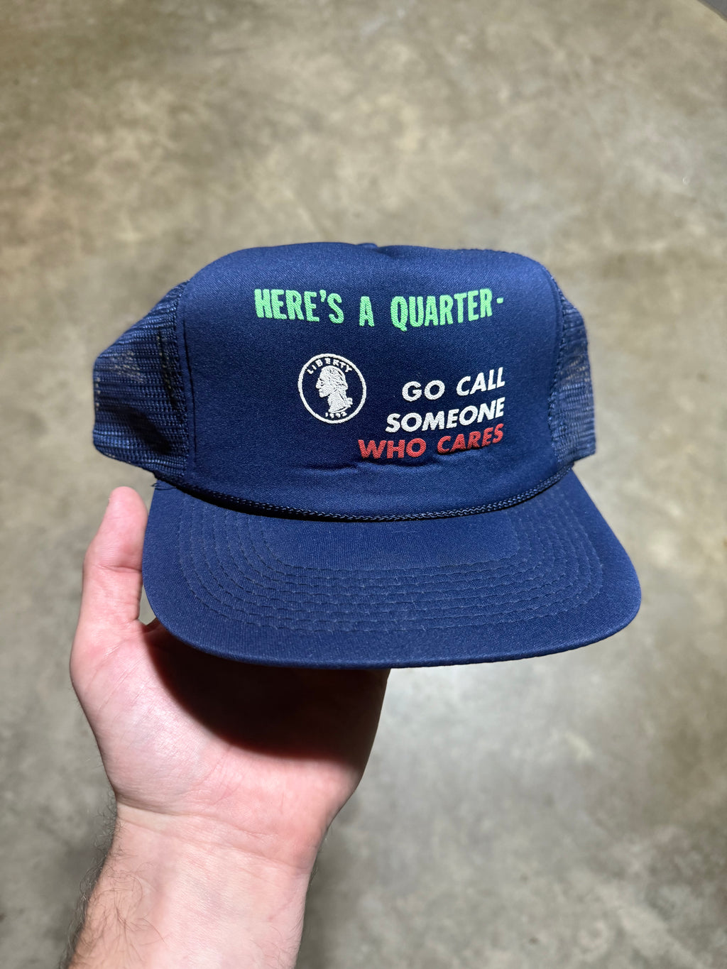 Vintage “Here’s A Quarter - Go Call Someone Who Cares” Trucker Hat